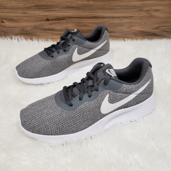 grey nike tanjun trainers